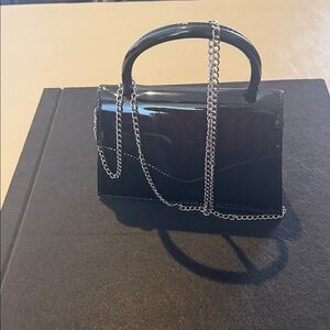 Sleek Black Mini Bag with Chain Accent